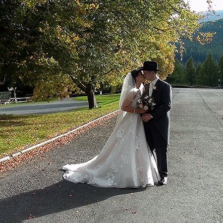 Bride and groom posing for photograph